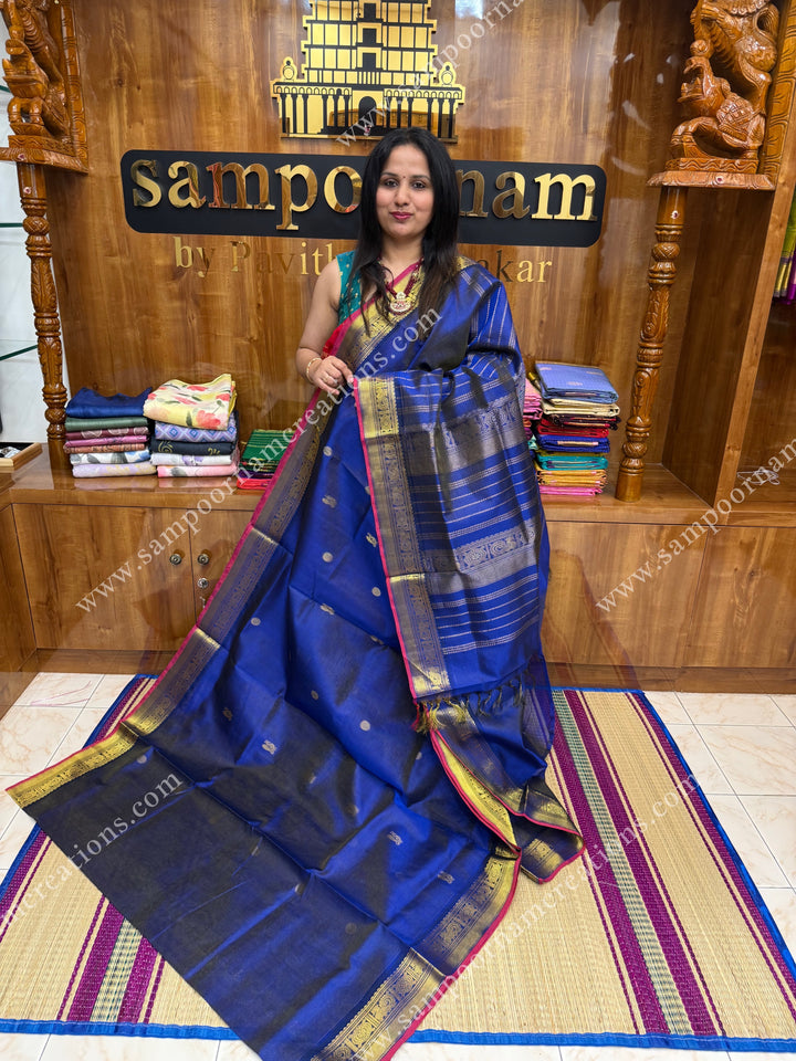Indigo Blue , Red Selvedge  , Zari butta in the body with  Vairaoosi Zari lines , traditional borders  and rich Pallu Silk Cotton Saree