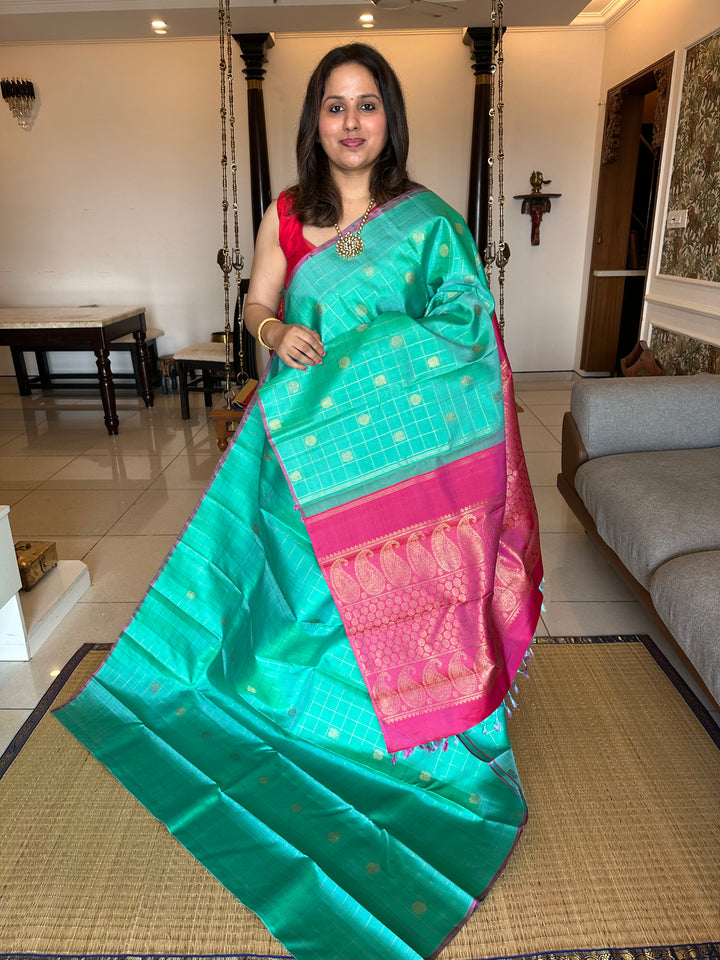 Sea Green with Pink Borderless Body Zari Checks with Mayil Chakram Butta and Rich Pallu- Pure silk Pure Zari Kanjivaram Silk Saree