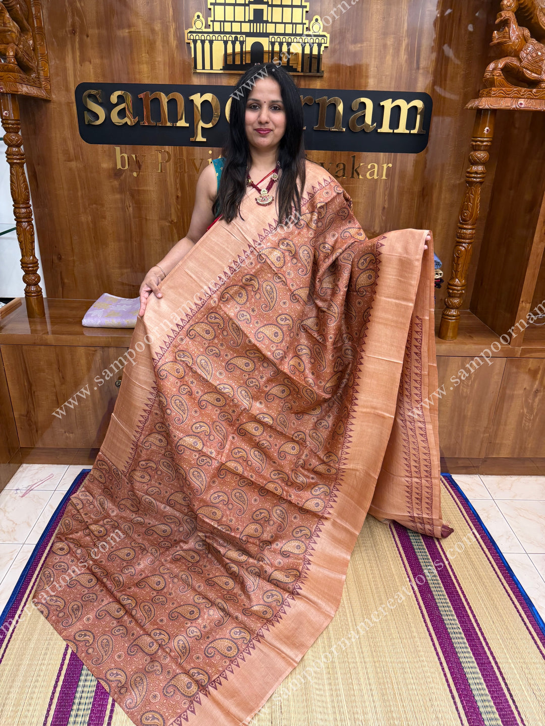 A Hand Painted beauty with Paisley Prints all over the body ,  Pure Tussar Silk Saree