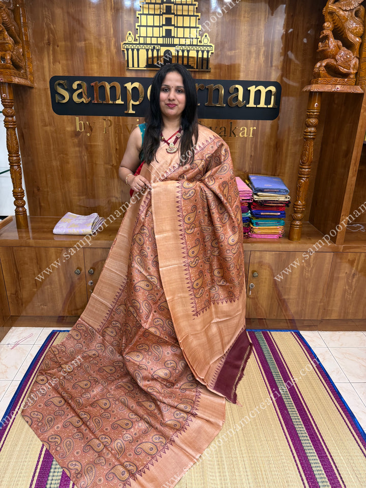 A Hand Painted beauty with Paisley Prints all over the body ,  Pure Tussar Silk Saree