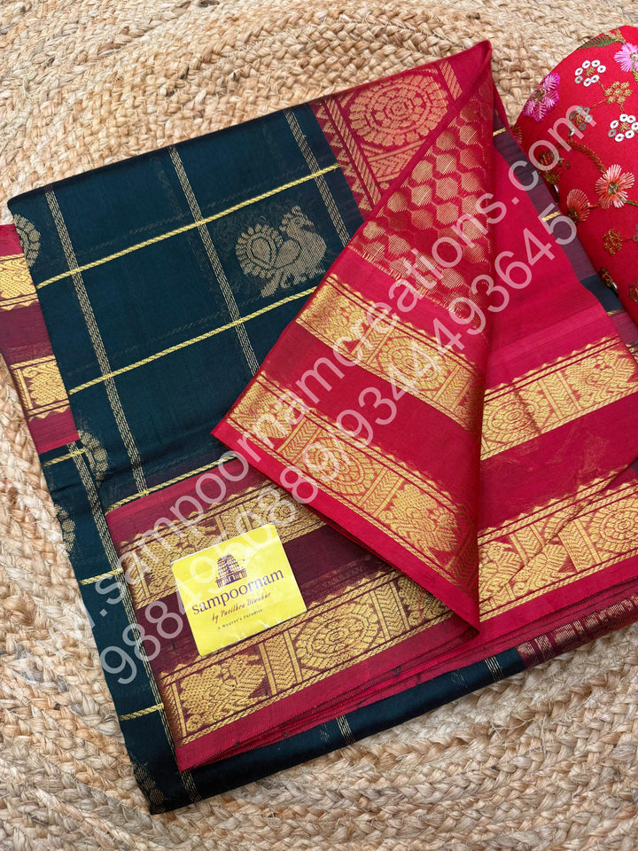 Bottle Green with Red  , Rich Mayil and Chakram butta in the body with Zari Checks , Traditional borders and Rich Pallu Pure Silk Cotton Saree