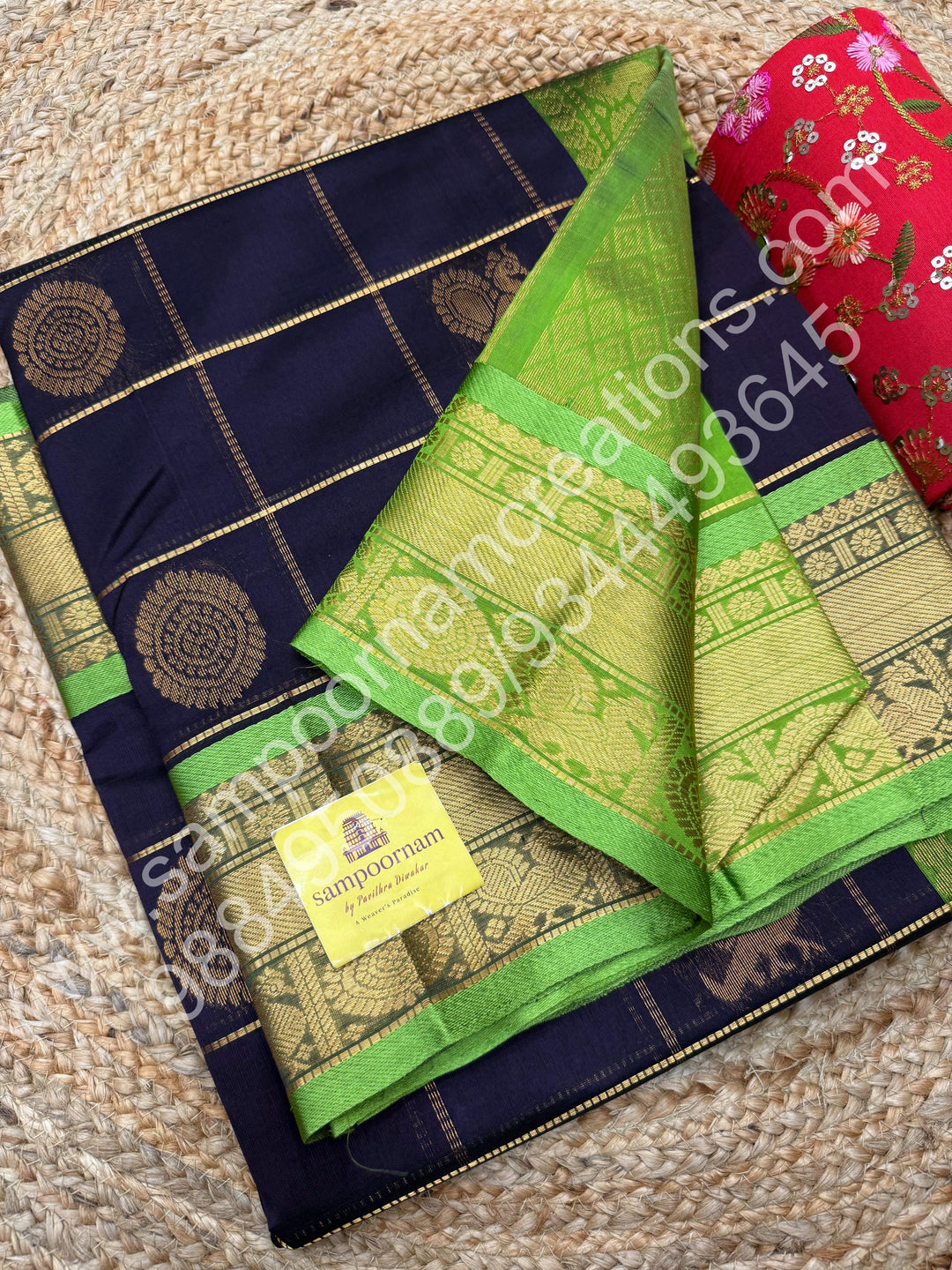Dark Blue with parrot Green  , Rich Mayil and Chakram butta in the body with Zari Checks , Traditional borders and Rich Pallu Pure Silk Cotton Saree