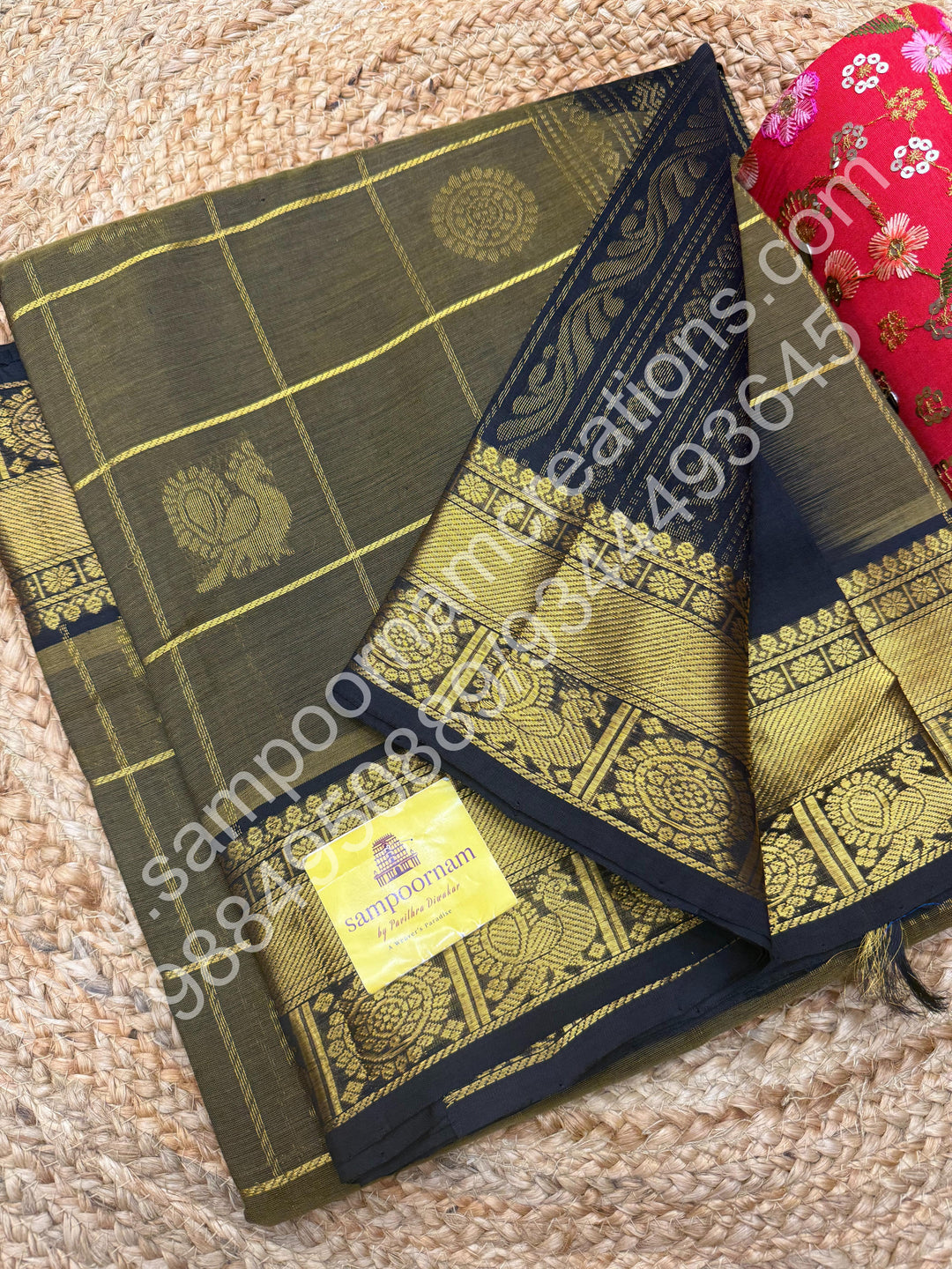 Sage Green with Black , Rich Mayil and Chakram butta in the body with Zari Checks , Traditional borders and Rich Pallu Pure Silk Cotton Saree