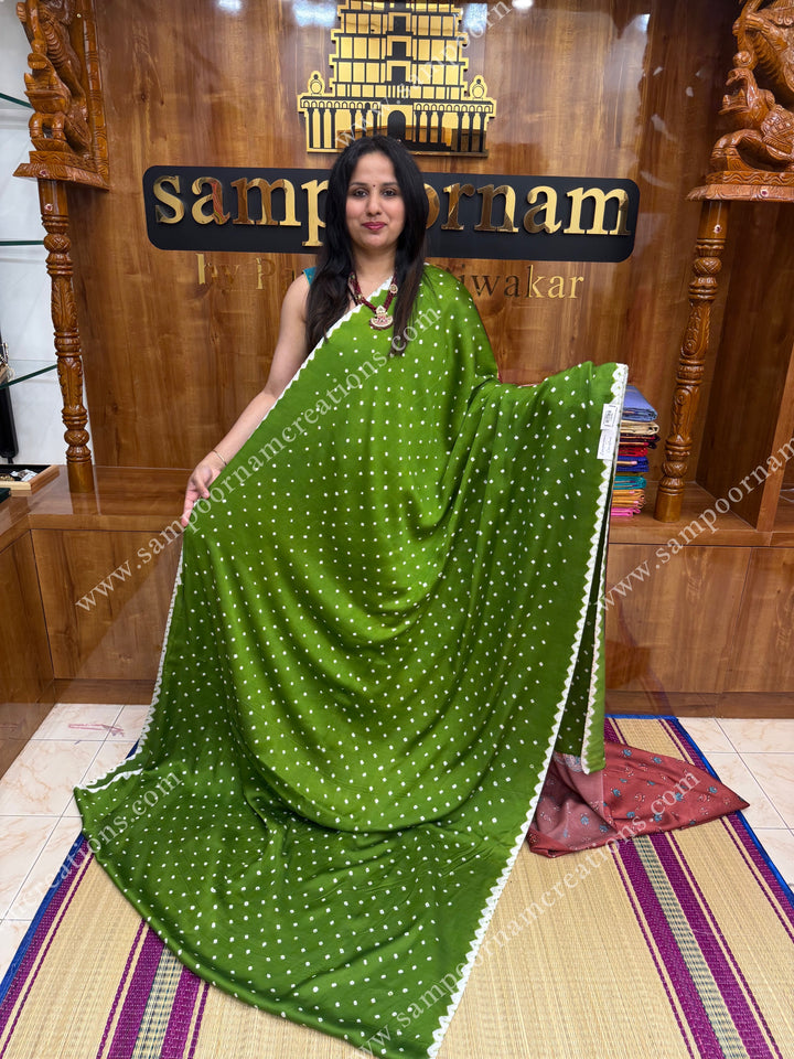 Green with Maroon  , Bandhini Prints in the body with beautiful Kalamkari Prints in the Pallu , Printed Blouse , Pure Modal Silk Saree