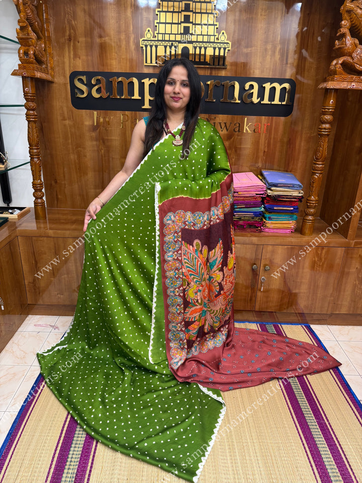 Green with Maroon  , Bandhini Prints in the body with beautiful Kalamkari Prints in the Pallu , Printed Blouse , Pure Modal Silk Saree