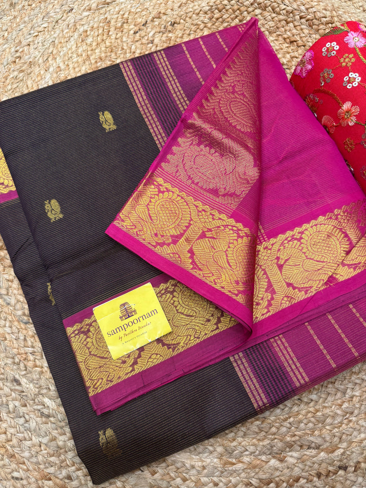 Coffee Brown with Pink ,  Vairaoosi Zari lines with Rich Annam  Zari Butta in the body , traditional borders and Rich Pallu Pure Silk Cotton Saree
