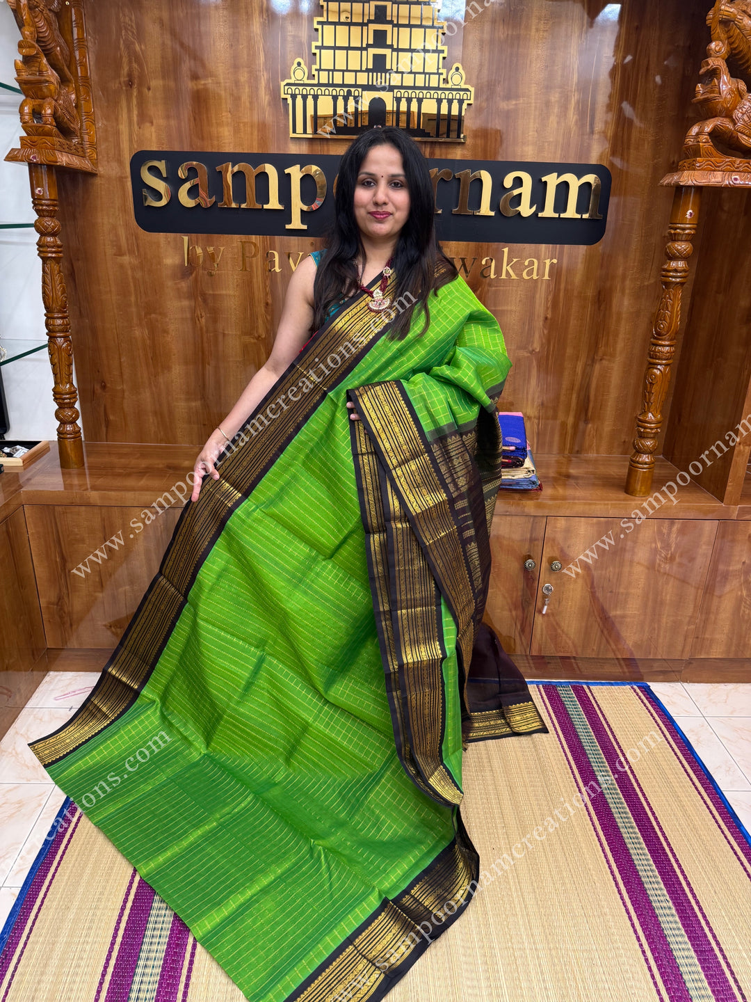 Kili Pachai with Brown , Rich Zari checks in the body and traditional borders ,  grand Pallu Korvai Silk Cotton Saree