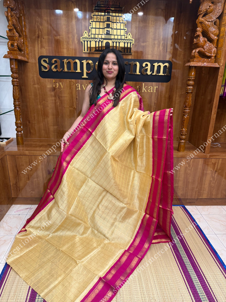 Cream with Pink , Rich Zari checks in the body and rettapet borders ,  grand Pallu Korvai Silk Cotton Saree