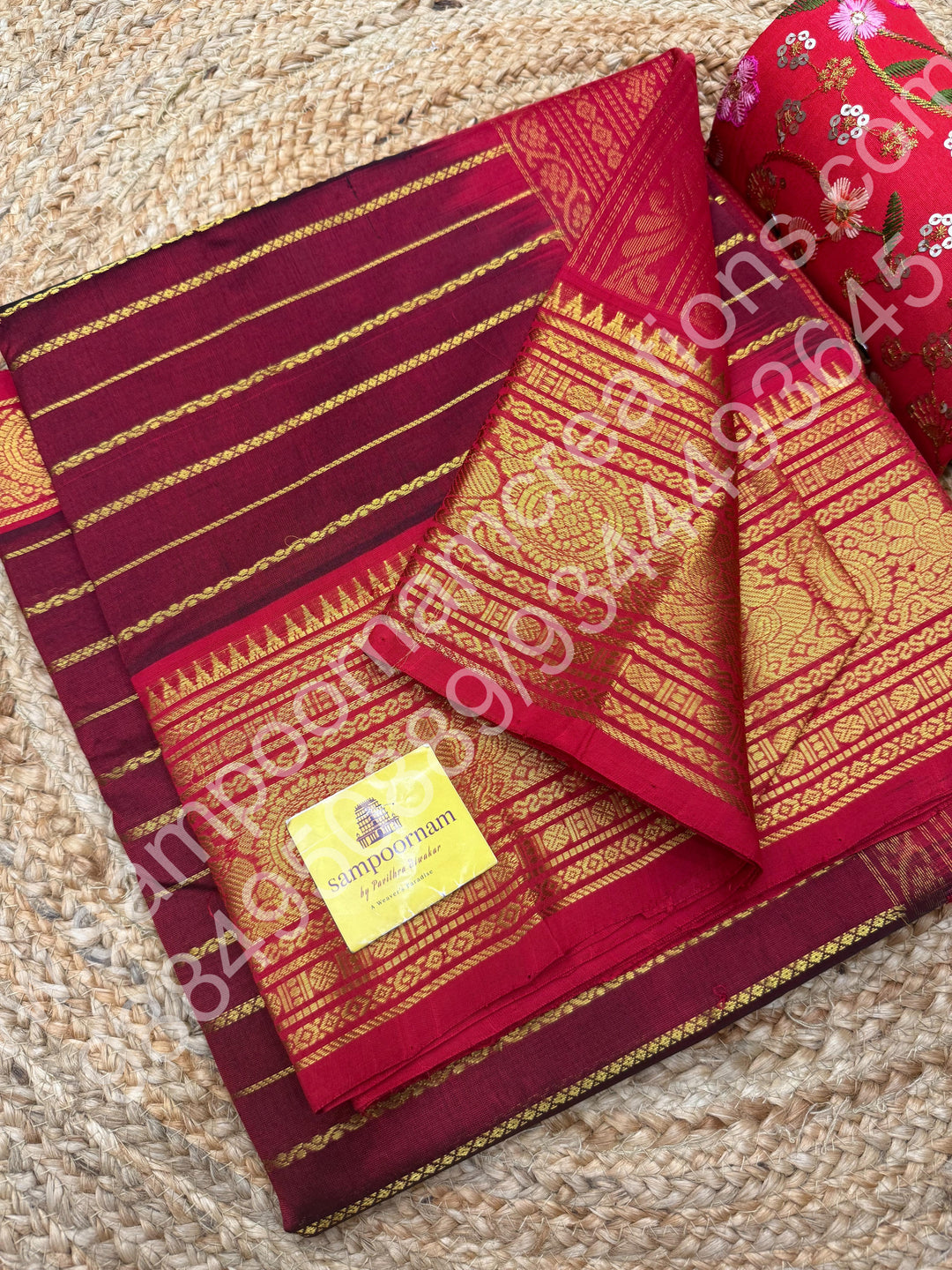 Dark Maroon with Red , Veldhari Zari Lines in the Body , Traditional Kanchi border , Rich Pallu , Pure Silk Cotton Saree