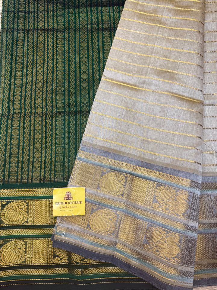 Cream with Green , Veldhari Zari Lines in the Body , Traditional Kanchi border , Rich Pallu , Pure Silk Cotton Saree
