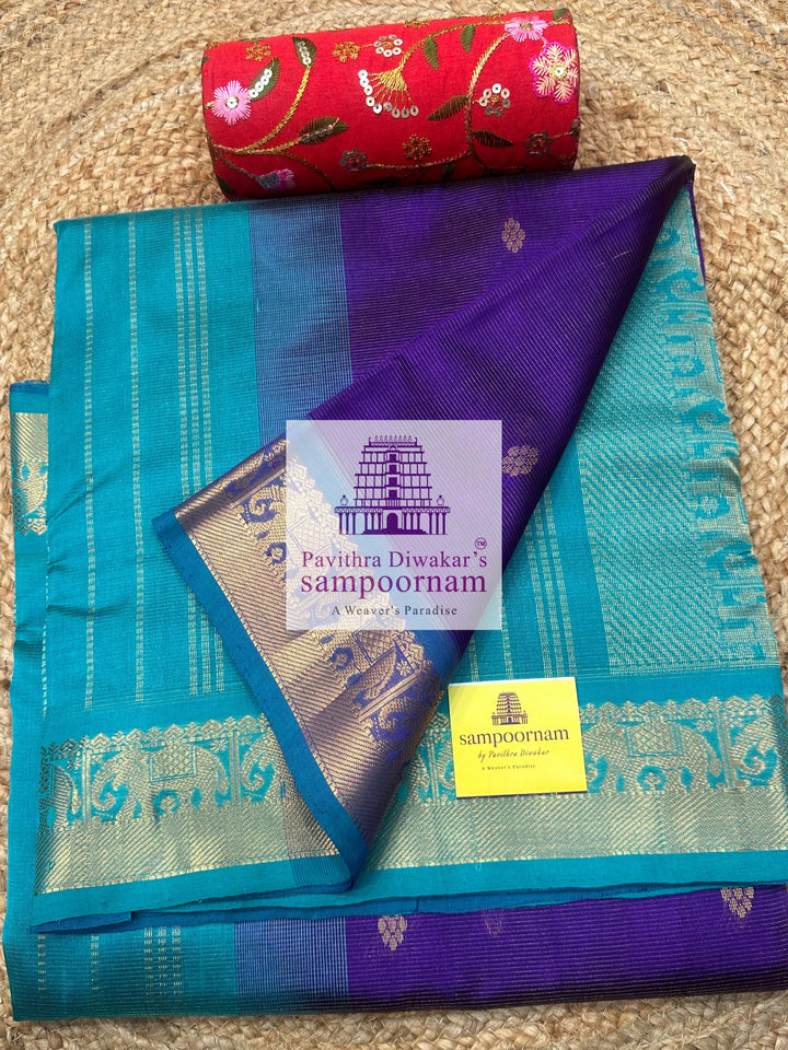Purple with Turquoise Blue , Zari butta in the body with Vairaoosi Zari Lines , traditional borders and rich Pallu ,Ten Yards Silk Cotton Saree
