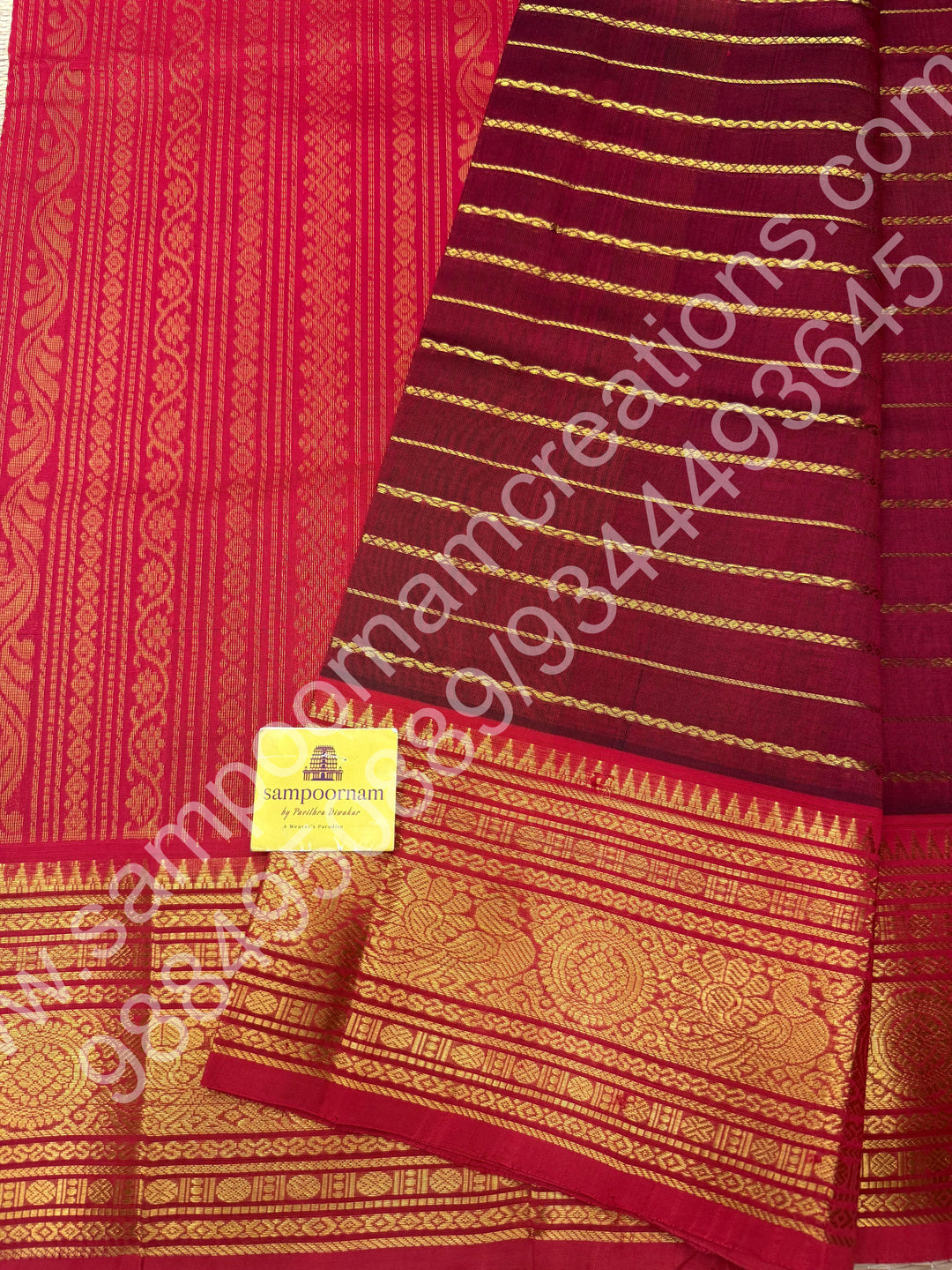 Dark Maroon with Red , Veldhari Zari Lines in the Body , Traditional Kanchi border , Rich Pallu , Pure Silk Cotton Saree