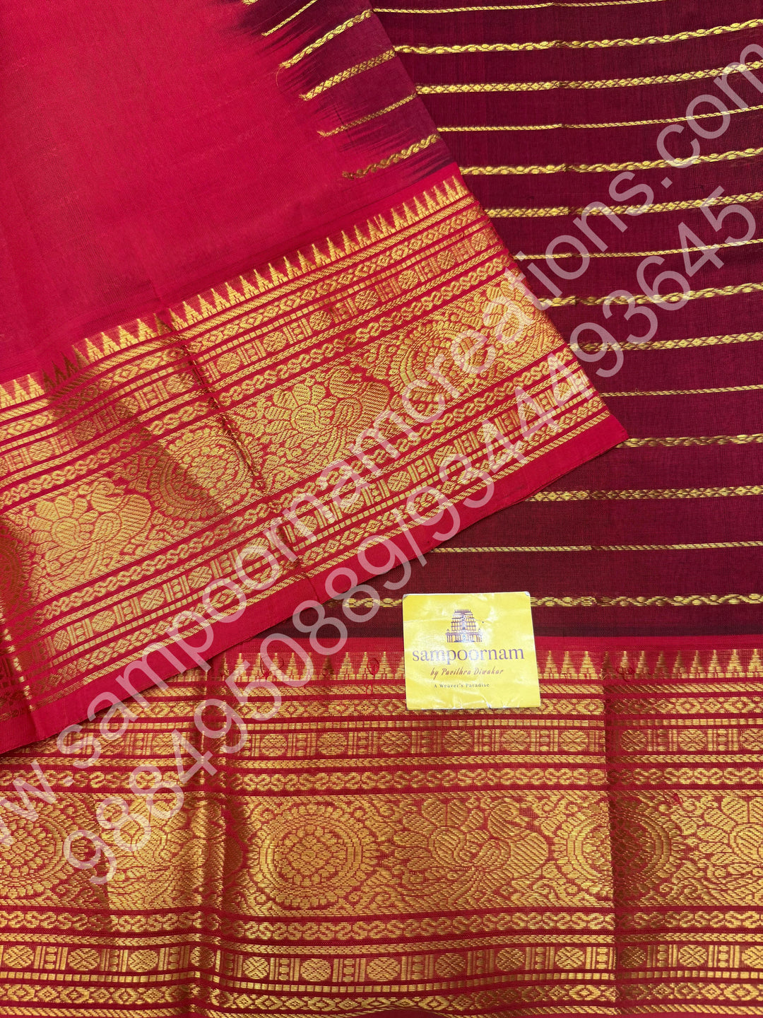 Dark Maroon with Red , Veldhari Zari Lines in the Body , Traditional Kanchi border , Rich Pallu , Pure Silk Cotton Saree