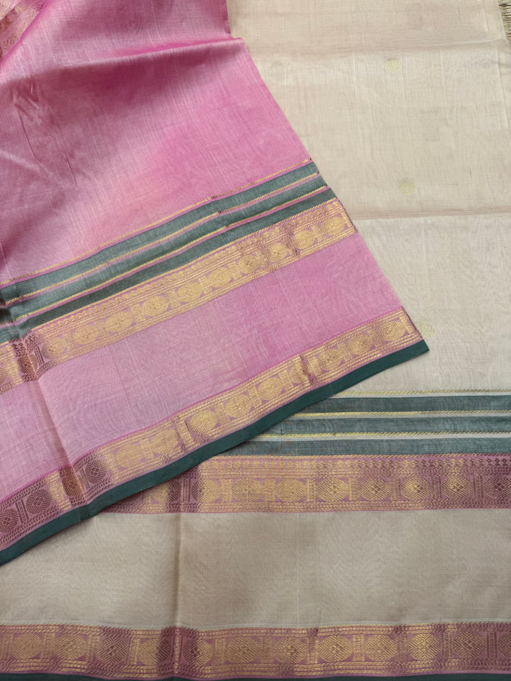 Cream with Baby Pink , Rich Annam and Rudraksh  Zari Butta in the body , Rettapet Rudraksh  borders and Rich Pallu Pure Silk Cotton Saree
