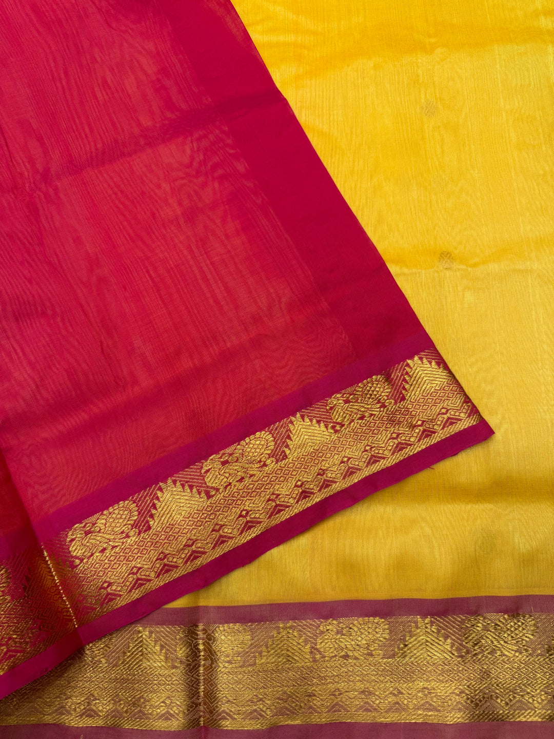 Manjal with Red ,  Rich  Zari Butta in the body , traditional borders and Rich Pallu Pure Silk Cotton Saree