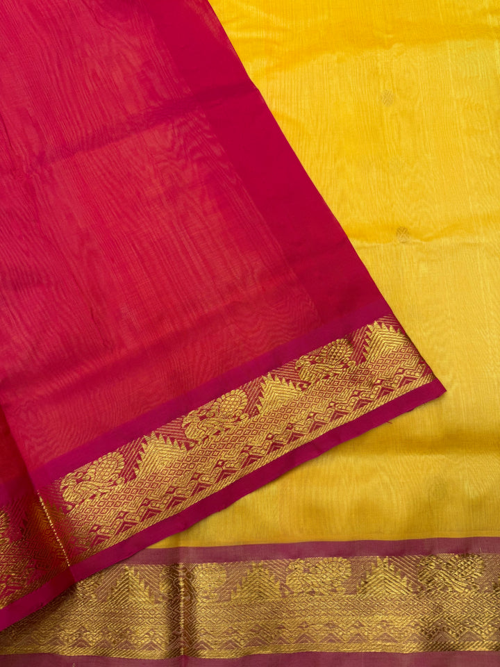 Manjal with Red ,  Rich  Zari Butta in the body , traditional borders and Rich Pallu Pure Silk Cotton Saree