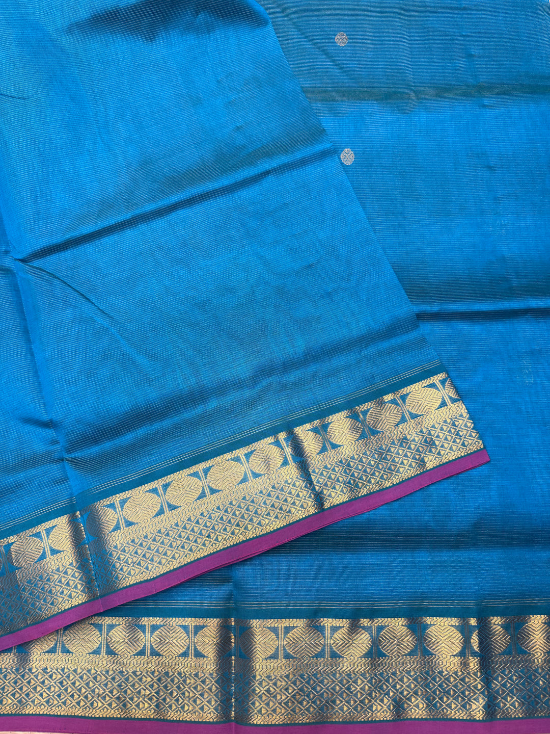 Double Shaded Chinthamani Blue , Pink Selvedge Vairaoosi Zari lines with Rich Annam and Rudraksh  Zari Butta in the body , traditional borders and Rich Pallu Pure Silk Cotton Saree