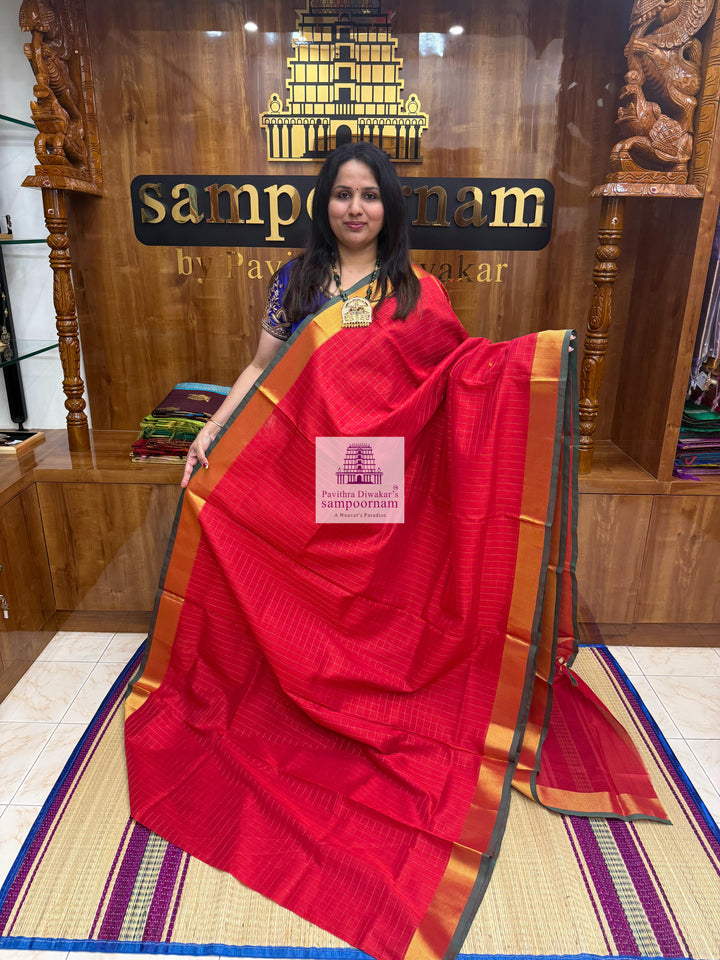 Passion Red , Green Selvedge , Vairaoosi Zari lines in the body , traditional borders and rich Pallu Silk Cotton Sarees