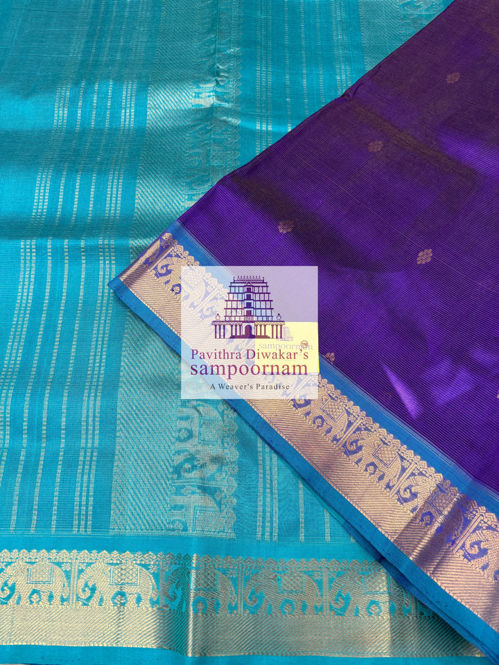 Purple with Turquoise Blue , Zari butta in the body with Vairaoosi Zari Lines , traditional borders and rich Pallu ,Ten Yards Silk Cotton Saree