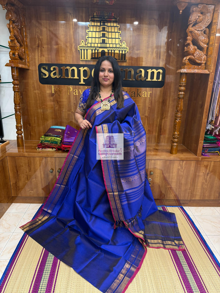 Moraccan Blue , Red Selvedge , Vairaoosi Zari lines in the body , traditional borders and rich Pallu Silk Cotton Sarees