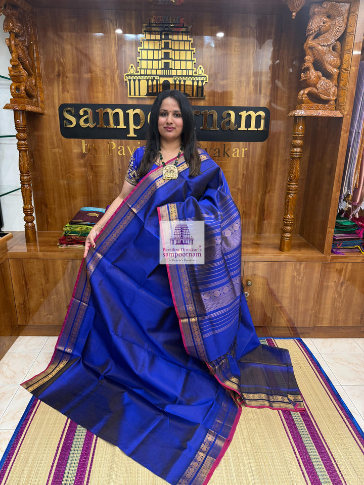Moraccan Blue , Red Selvedge , Vairaoosi Zari lines in the body , traditional borders and rich Pallu Silk Cotton Sarees