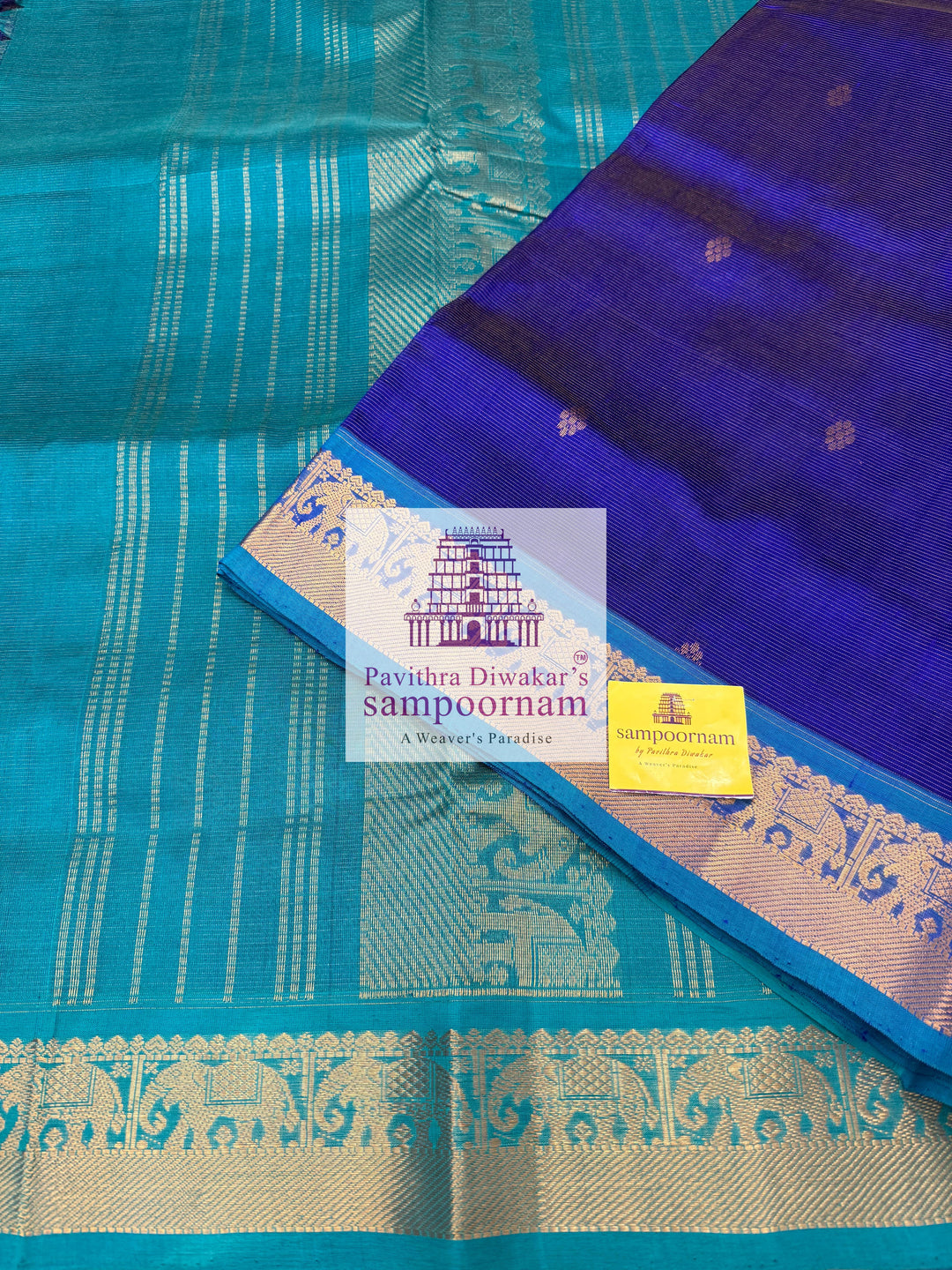 Dark Blue with Light Blue , Vairaoosi Zari Lines in the body with Rich Butta , traditional borders and rich Pallu ,Ten Yards Silk Cotton Saree