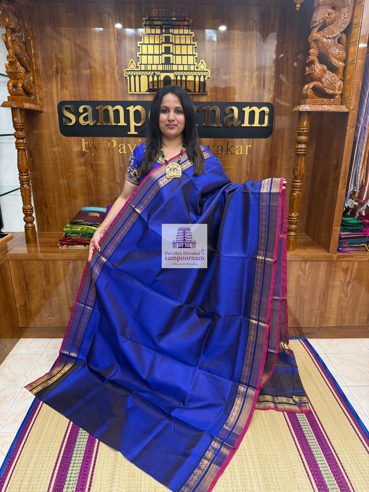 Moraccan Blue , Red Selvedge , Vairaoosi Zari lines in the body , traditional borders and rich Pallu Silk Cotton Sarees