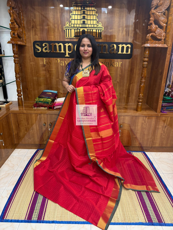 Passion Red , Green Selvedge , Vairaoosi Zari lines in the body , traditional borders and rich Pallu Silk Cotton Sarees