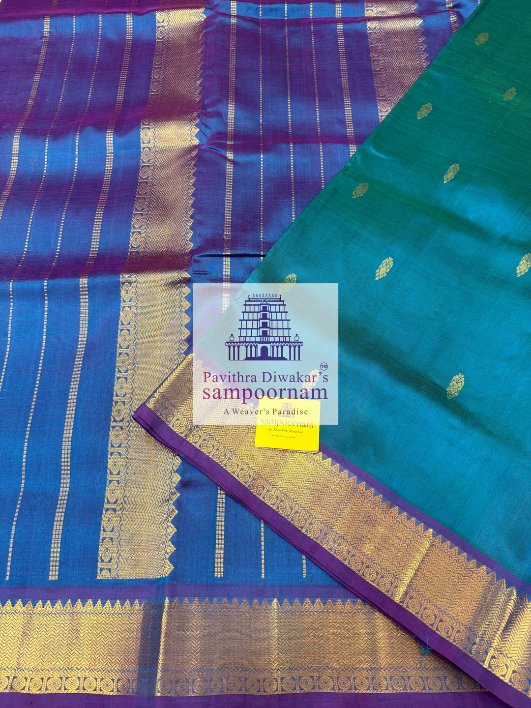 Blue with Mayilkazhuthu Blue  , Zari butta in the body ,   traditional borders and grand Pallu , Ten Yards Silk Cotton Saree