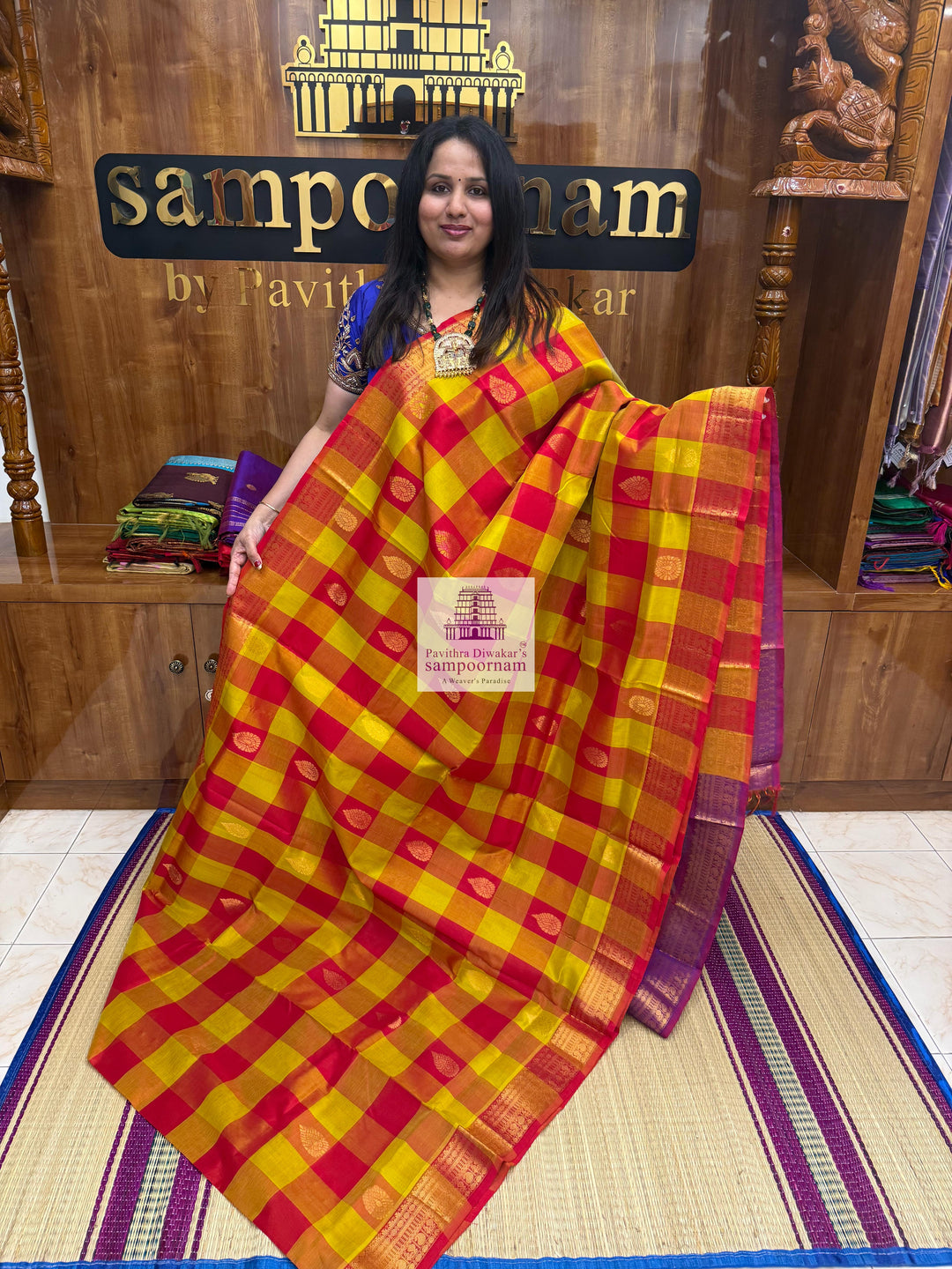 Red , Orange and Mustard with Purple , Mango butta in the body , traditional borders and rich Pallu Silk Cotton Saree