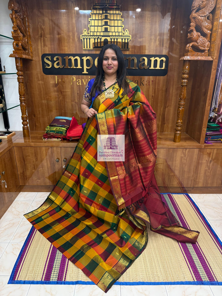 Red , Green and Manjal with Maroon , Paalum Pazham Checks with rich butta , traditional borders and rich Pallu Silk Cotton Saree
