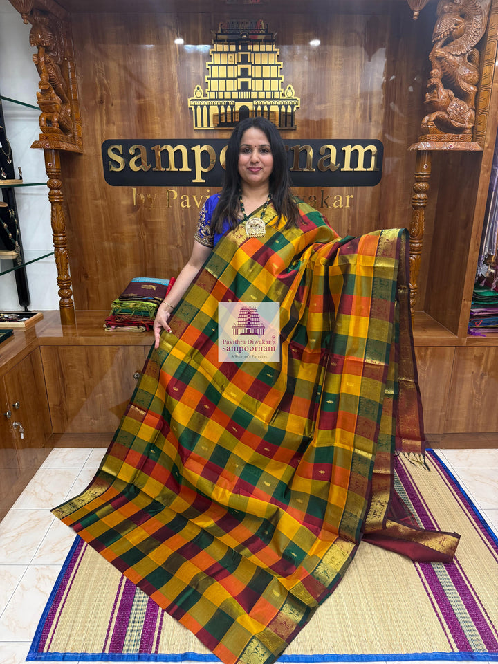 Red , Green and Manjal with Maroon , Paalum Pazham Checks with rich butta , traditional borders and rich Pallu Silk Cotton Saree