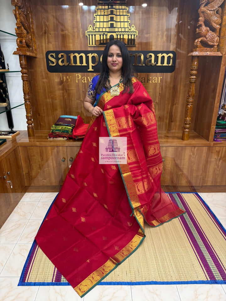 Red , Green Selvedge , Kollam Zari Motif in the Body , Rettapet Border  and Rich Pallu Silk Cotton Saree