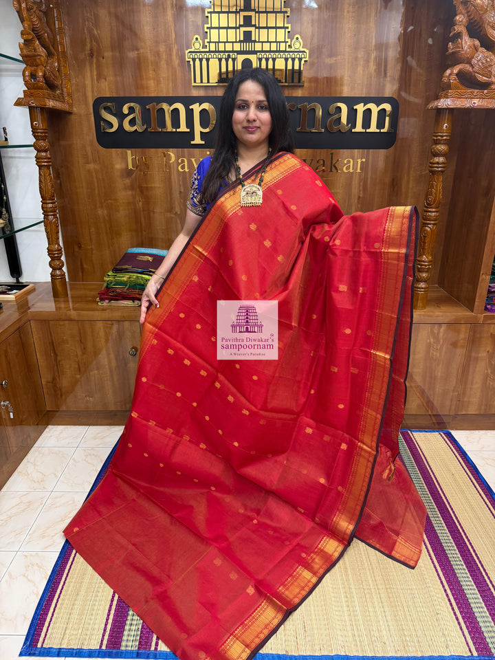 Classic Red , Maroon Selvedge , Annam  Zari Butta and  Vairaoosi Zari lines in the body , traditional borders and rich Pallu Silk Cotton Sarees