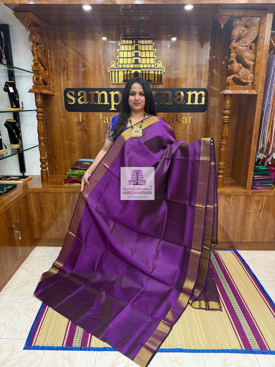 Dark Purple , Zari checks in the body , traditional border and rich Pallu Silk Cotton Saree