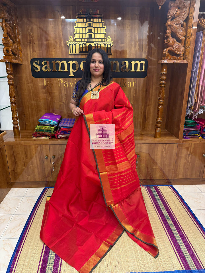 Red , Green Selvedge  , Zari Vairaoosi in the body , traditional border and rich Pallu Silk Cotton Saree