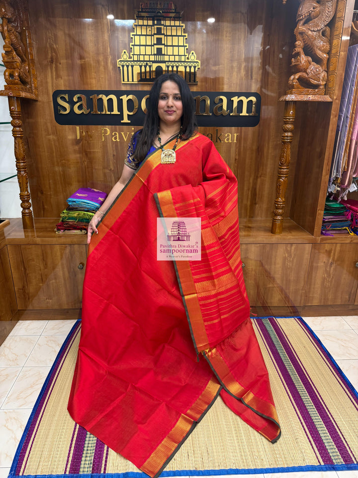 Red , Green Selvedge  , Zari Vairaoosi in the body , traditional border and rich Pallu Silk Cotton Saree