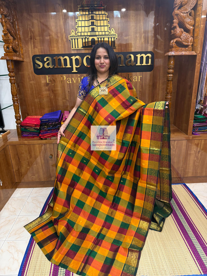 Red , Green and Manjal with Green , Paalum Pazham Checks with rich butta , traditional borders and rich Pallu Silk Cotton Saree