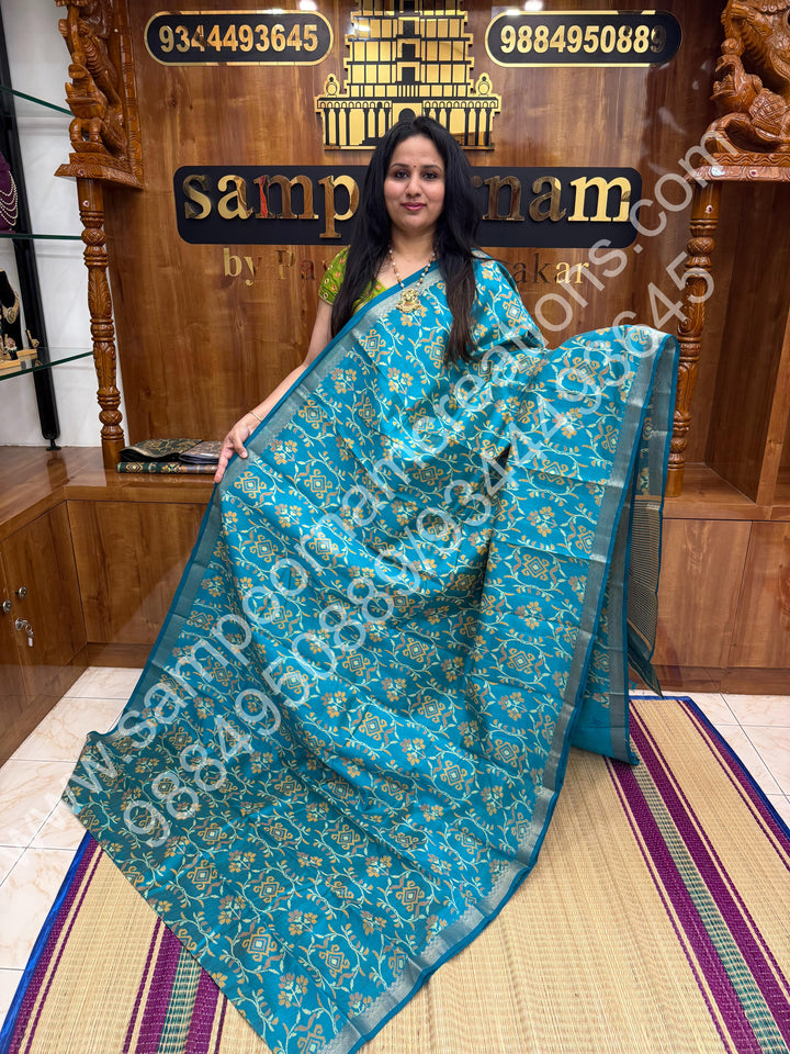 Light Blue , Floral  Prints in the body , tissue Pallu and Printed Blouse Semi Tussar Saree