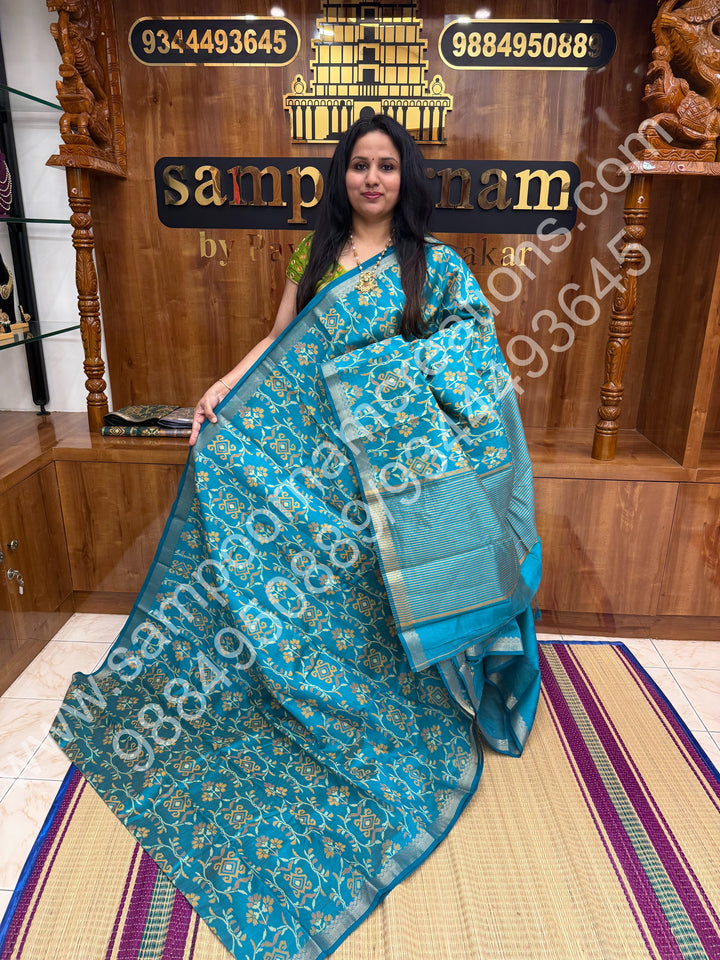 Light Blue , Floral  Prints in the body , tissue Pallu and Printed Blouse Semi Tussar Saree