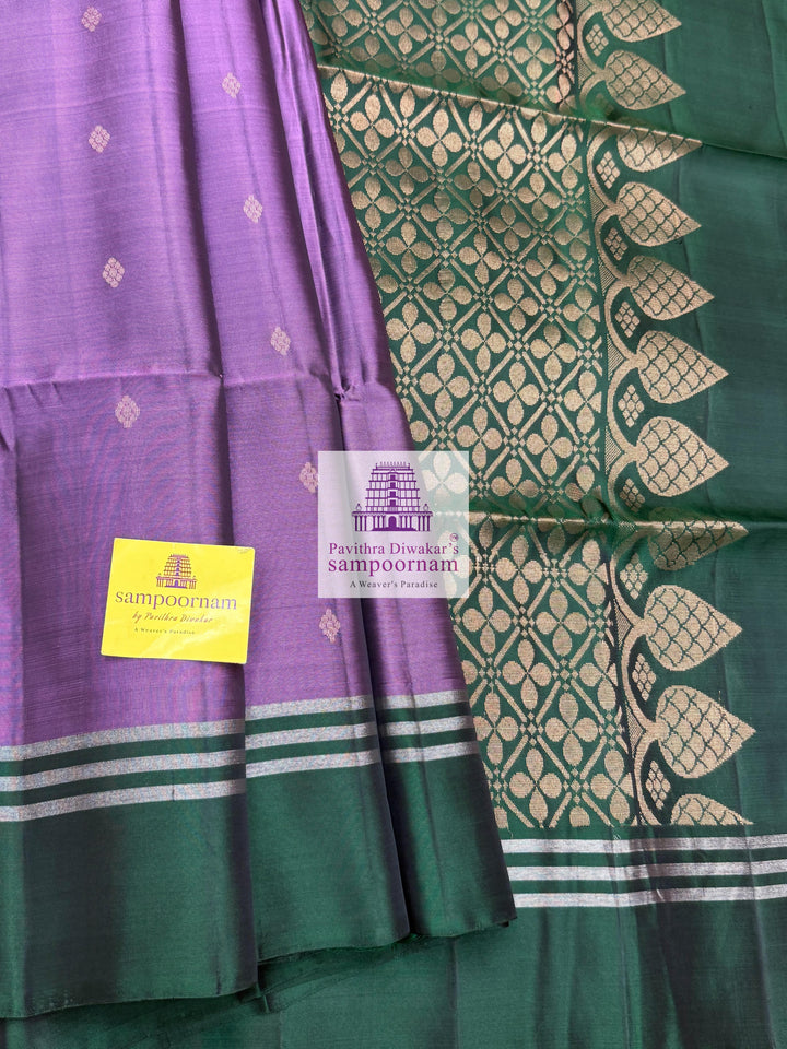 Mauve with Dark Green, rich Zari Butta in the body , Plain borders , rich Pallu Handloom Semi Soft Silk Saree