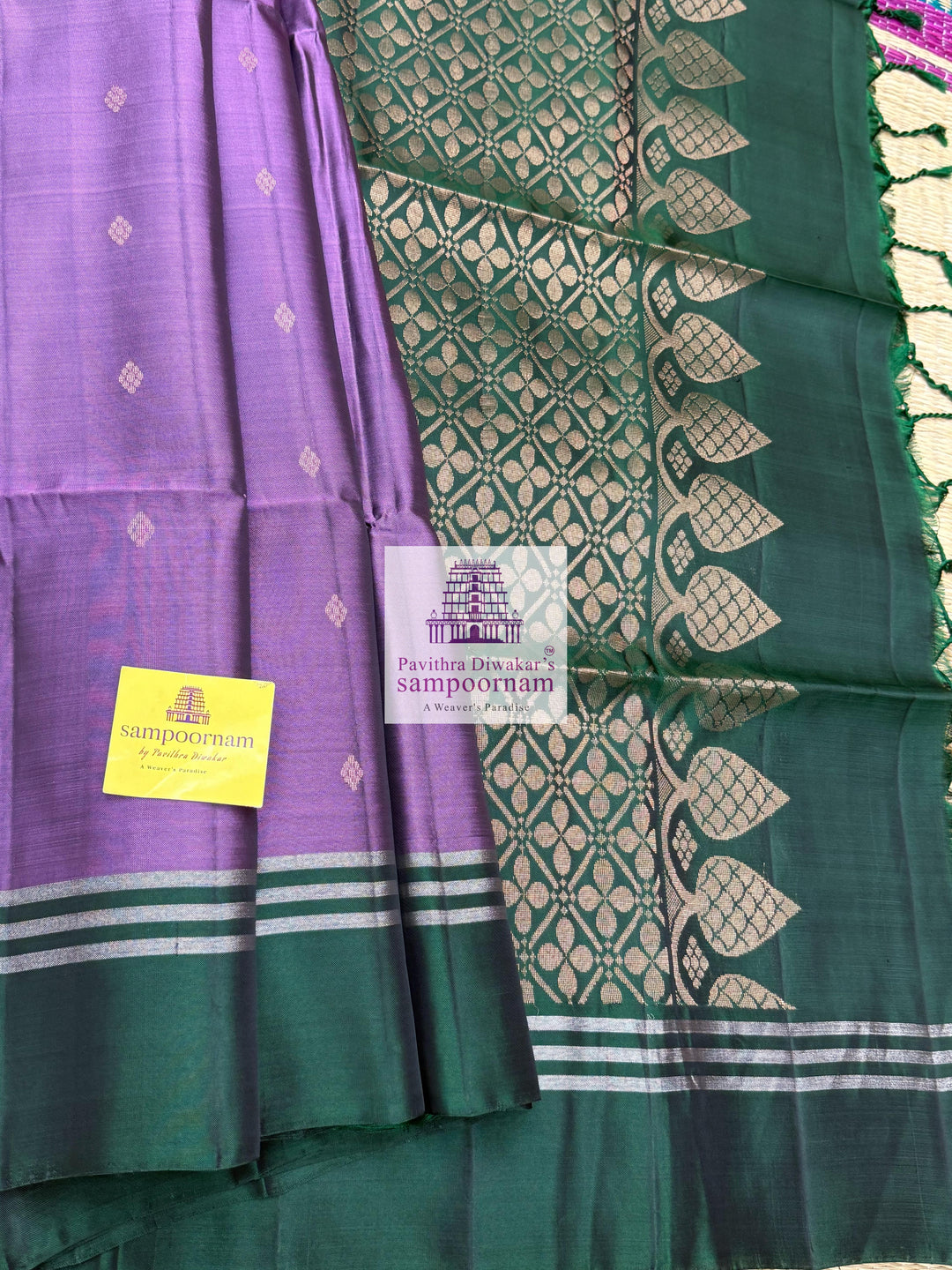 Mauve with Dark Green, rich Zari Butta in the body , Plain borders , rich Pallu Handloom Semi Soft Silk Saree