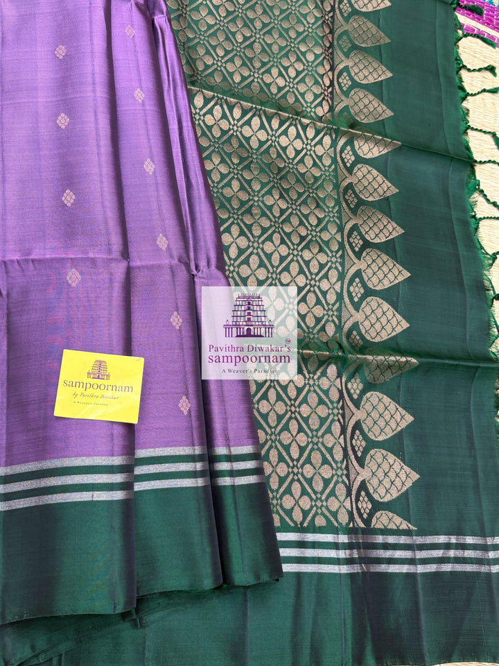 Mauve with Dark Green, rich Zari Butta in the body , Plain borders , rich Pallu Handloom Semi Soft Silk Saree