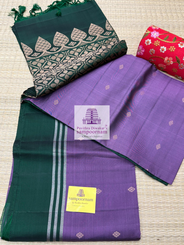 Mauve with Dark Green, rich Zari Butta in the body , Plain borders , rich Pallu Handloom Semi Soft Silk Saree