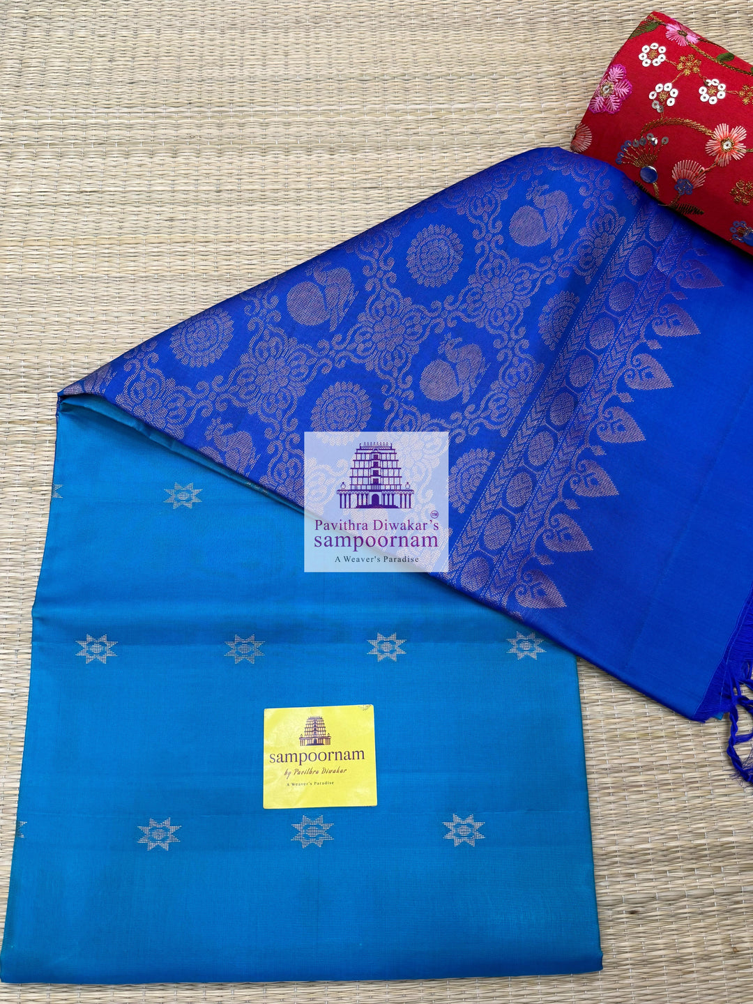 Blue with Dark Blue , rich Zari Butta in the body , Plain borders , rich Pallu Handloom Semi Soft Silk Saree