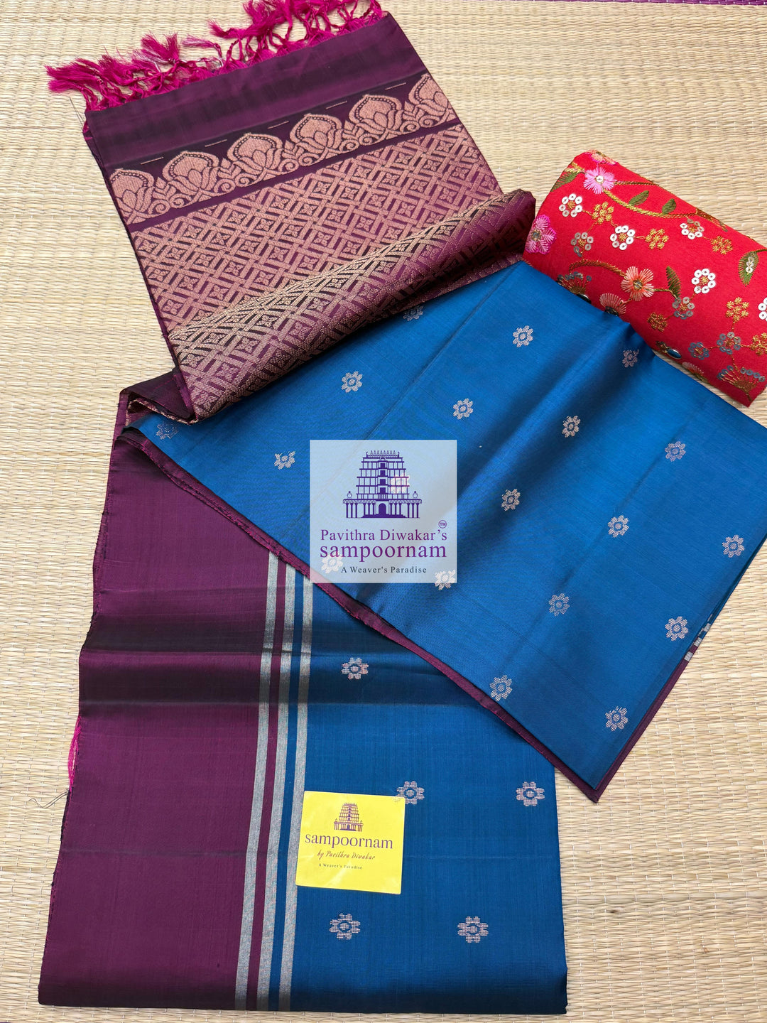 Classic Blue with Magenta , rich Zari Butta in the body , Plain borders , rich Pallu Handloom Semi Soft Silk Saree