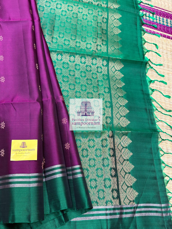 Wine with Green , rich Zari Butta in the body , Plain borders , rich Pallu Handloom Semi Soft Silk Saree