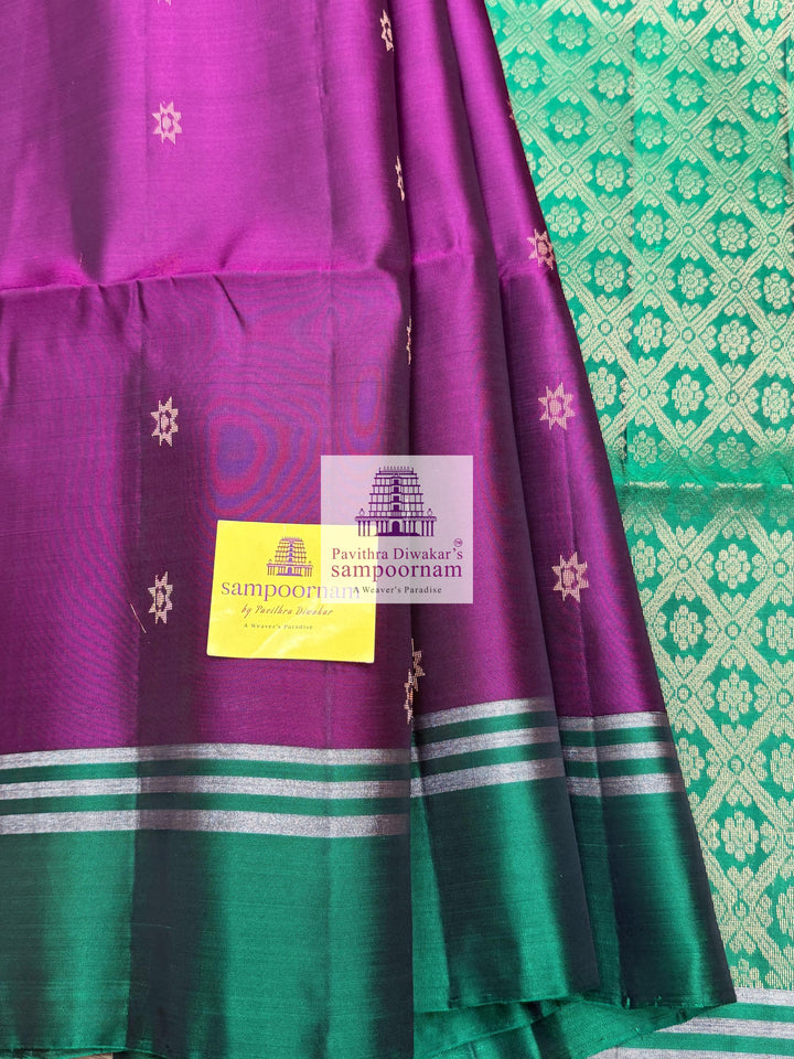 Wine with Green , rich Zari Butta in the body , Plain borders , rich Pallu Handloom Semi Soft Silk Saree
