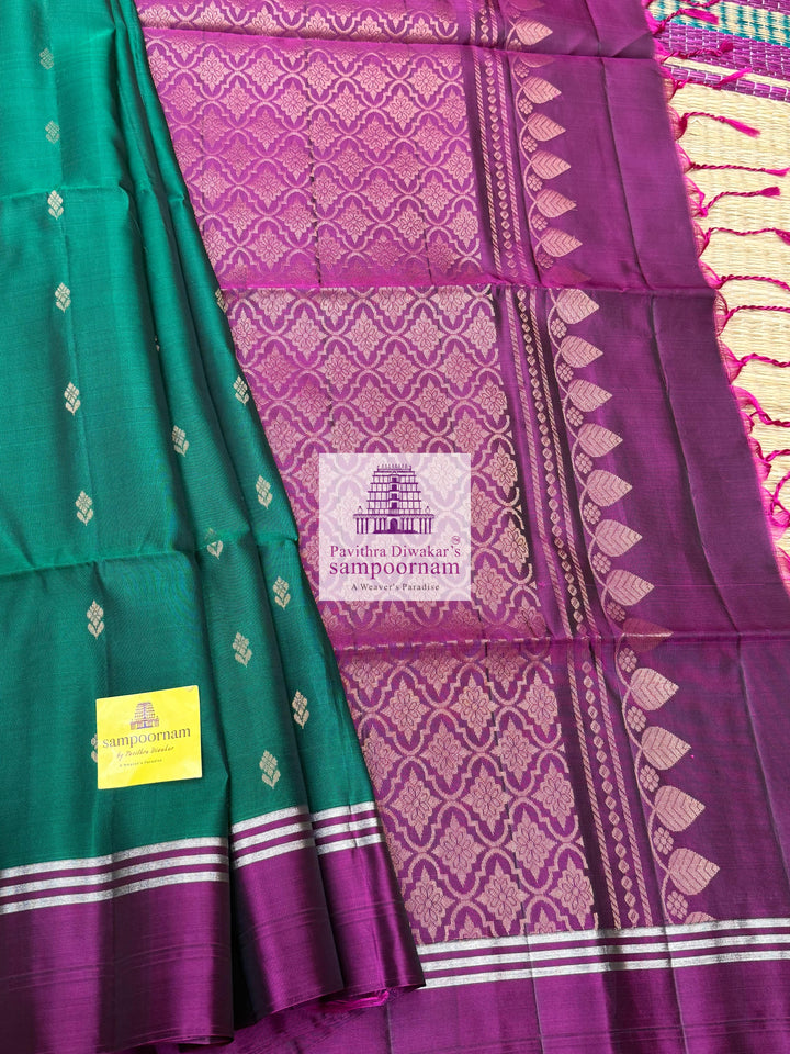 Forest Green with Magenta , rich Zari Butta in the body , Plain borders , rich Pallu Handloom Semi Soft Silk Saree