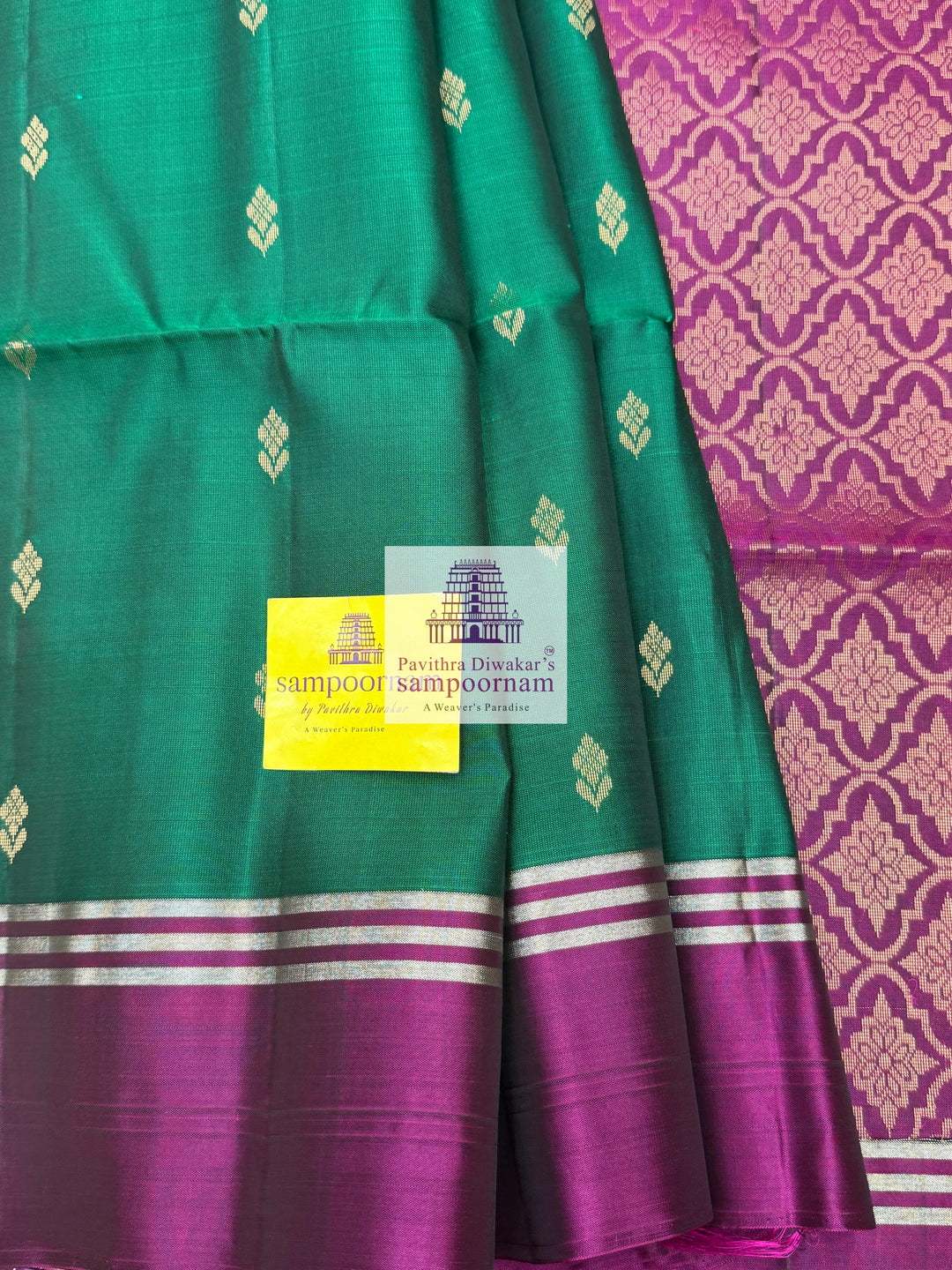 Forest Green with Magenta , rich Zari Butta in the body , Plain borders , rich Pallu Handloom Semi Soft Silk Saree
